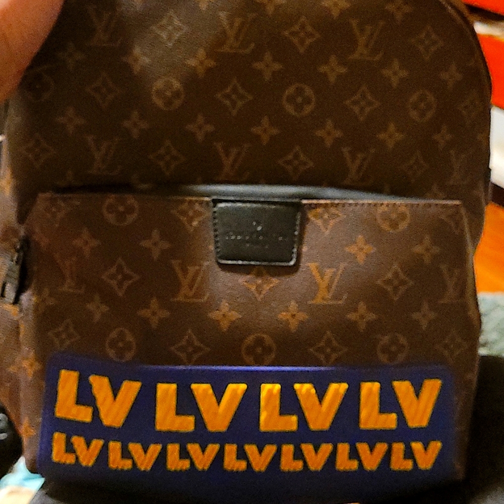 LOUIS VUITTON Discovery Backpack Limited Edition LV Rubber monogram canvas PM